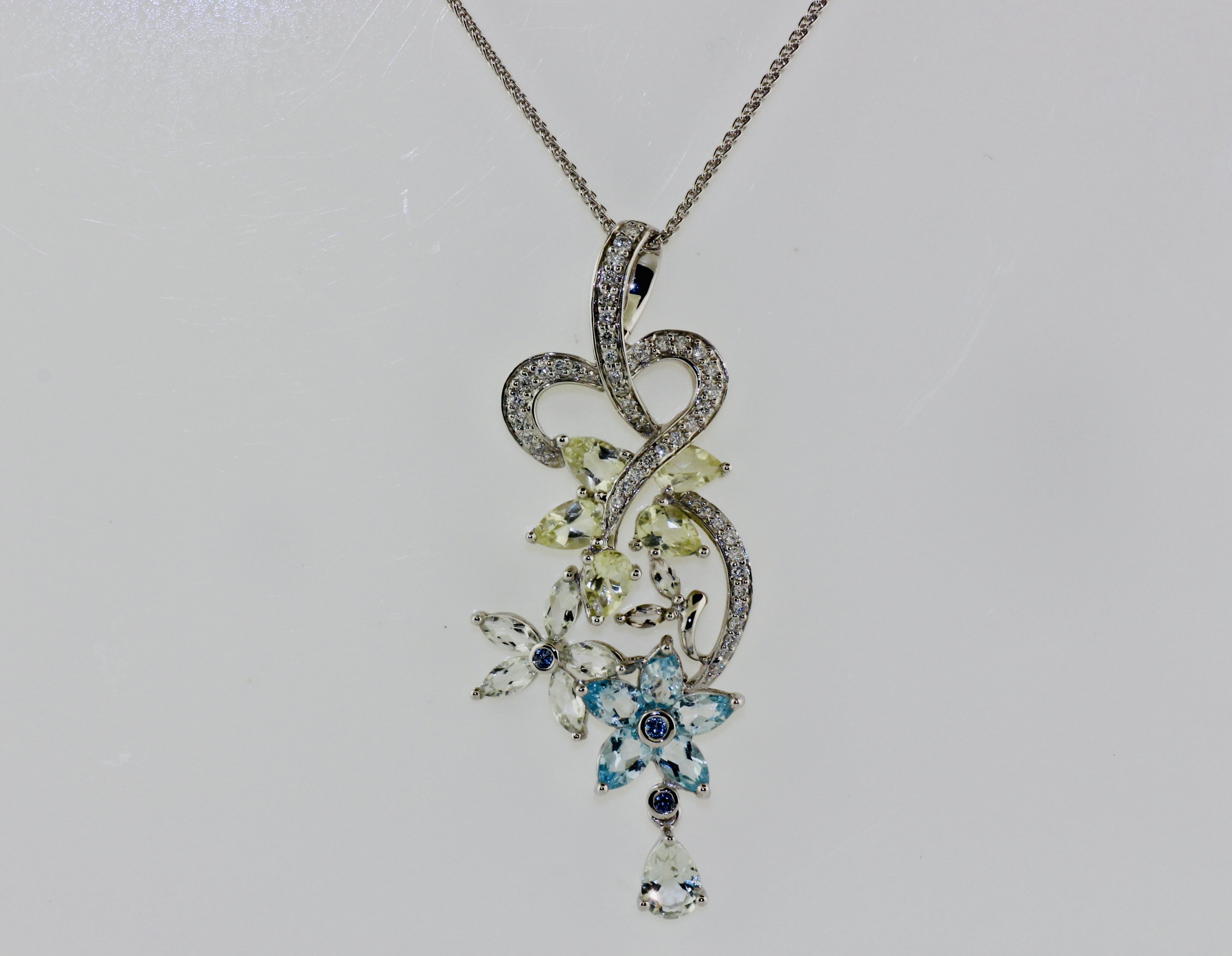 14K White Gold Abstract Blue Topaz Flower Pendant