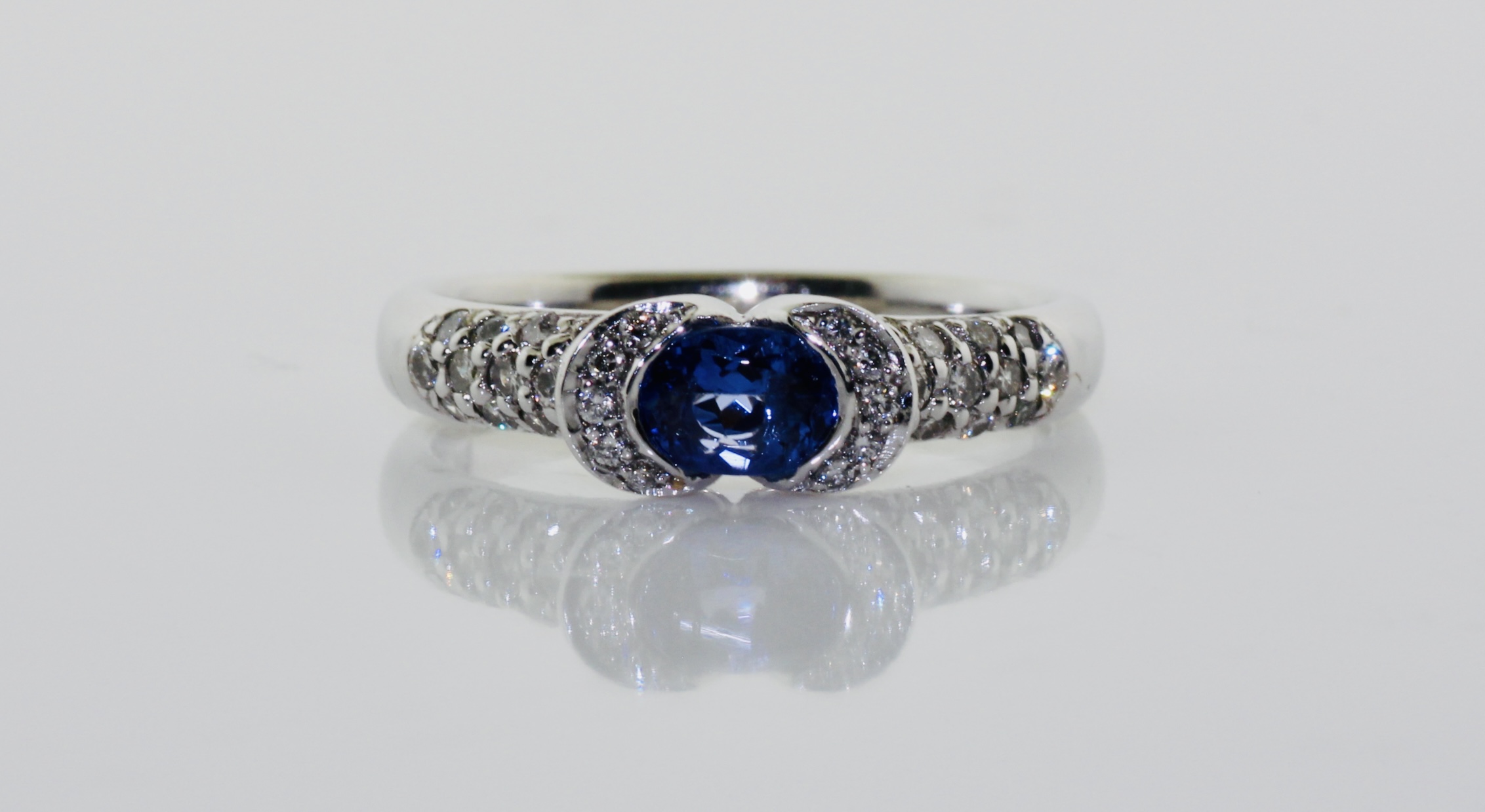 14K White Gold Tanzanite (0.53ct) and Diamond (0.32ctw) Ring