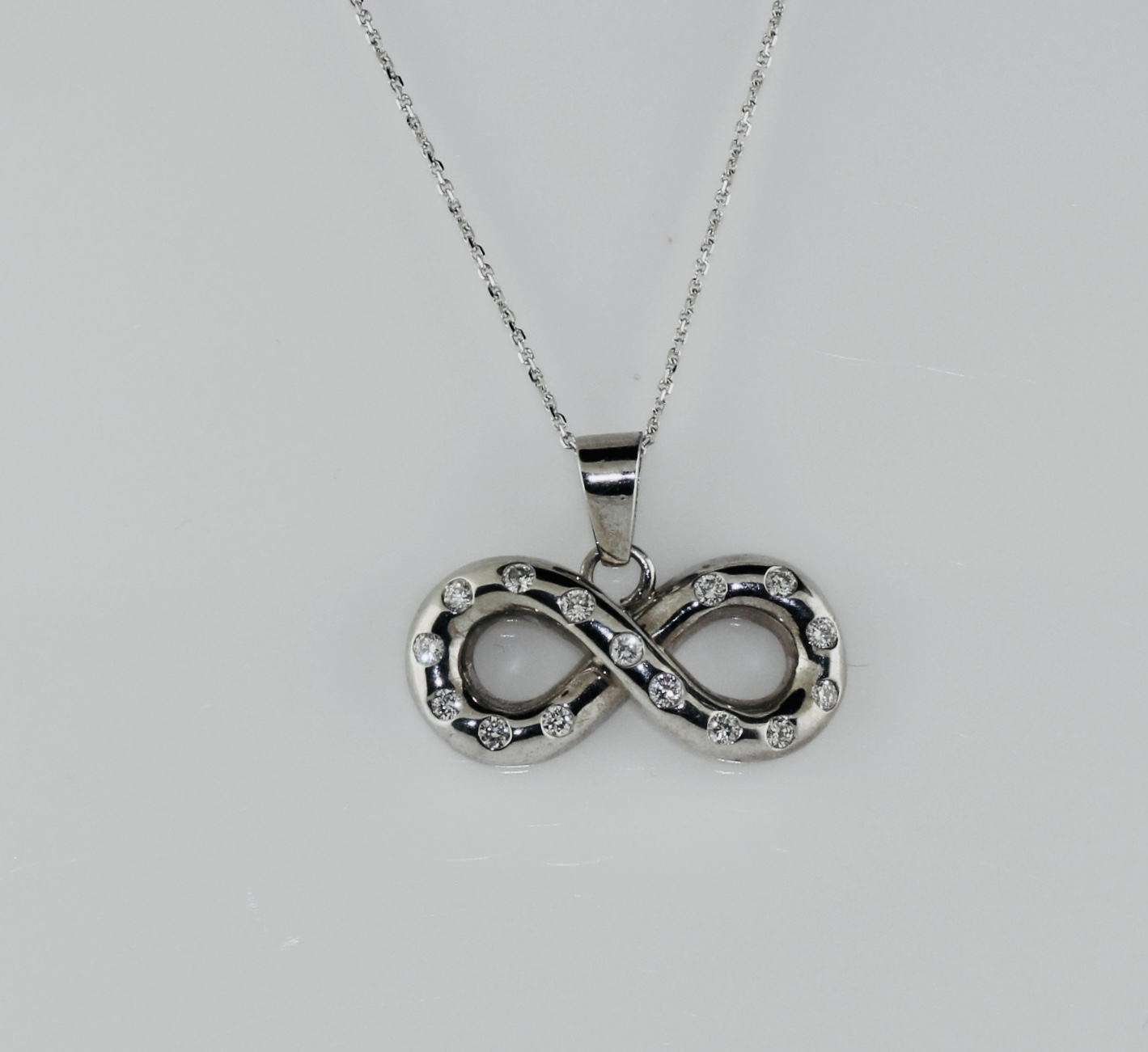 14K White Gold Infinity Pendant with Diamonds (0.45ctw)