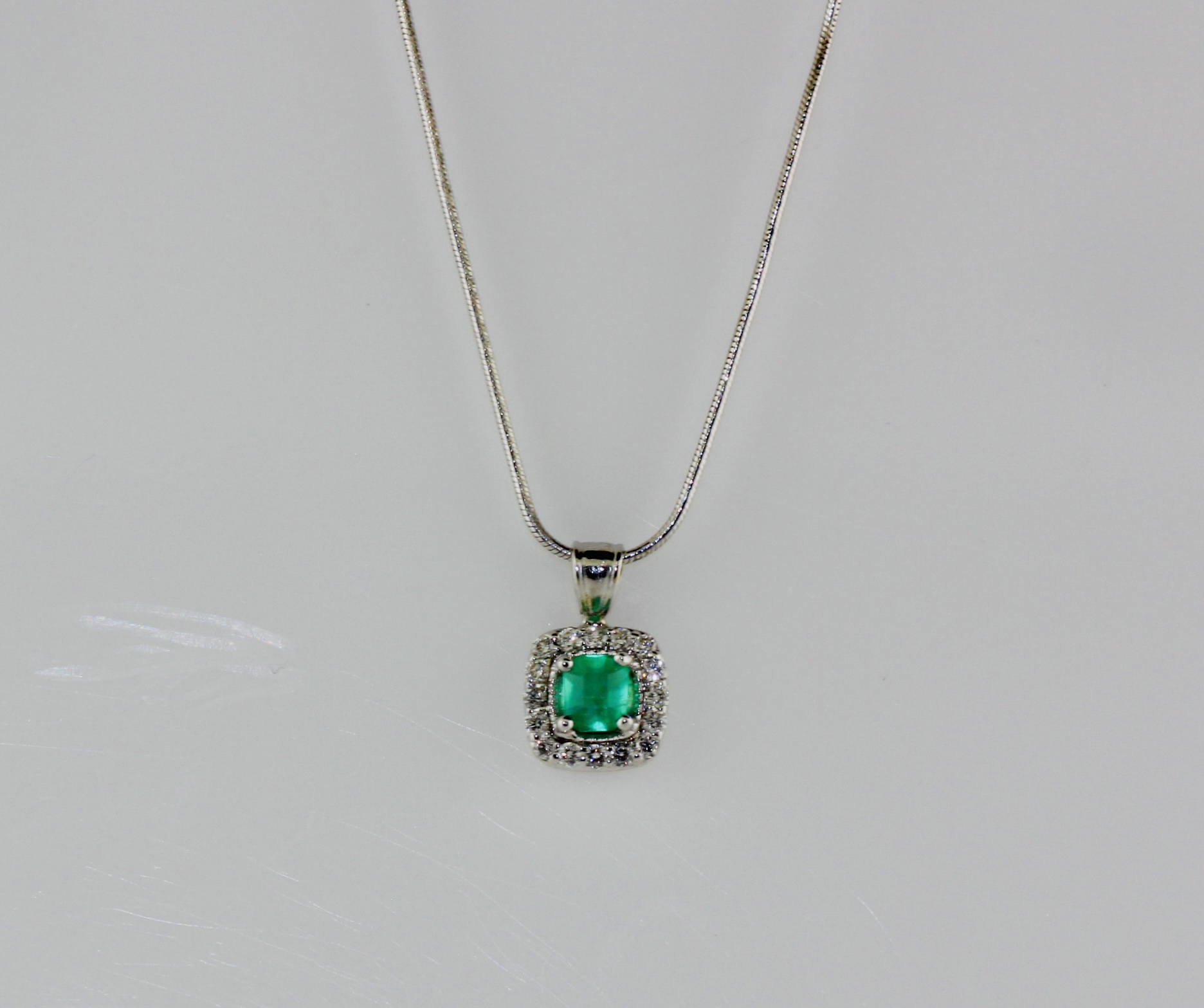 14K White Gold Diamond and Emerald (.23ct) Pendant