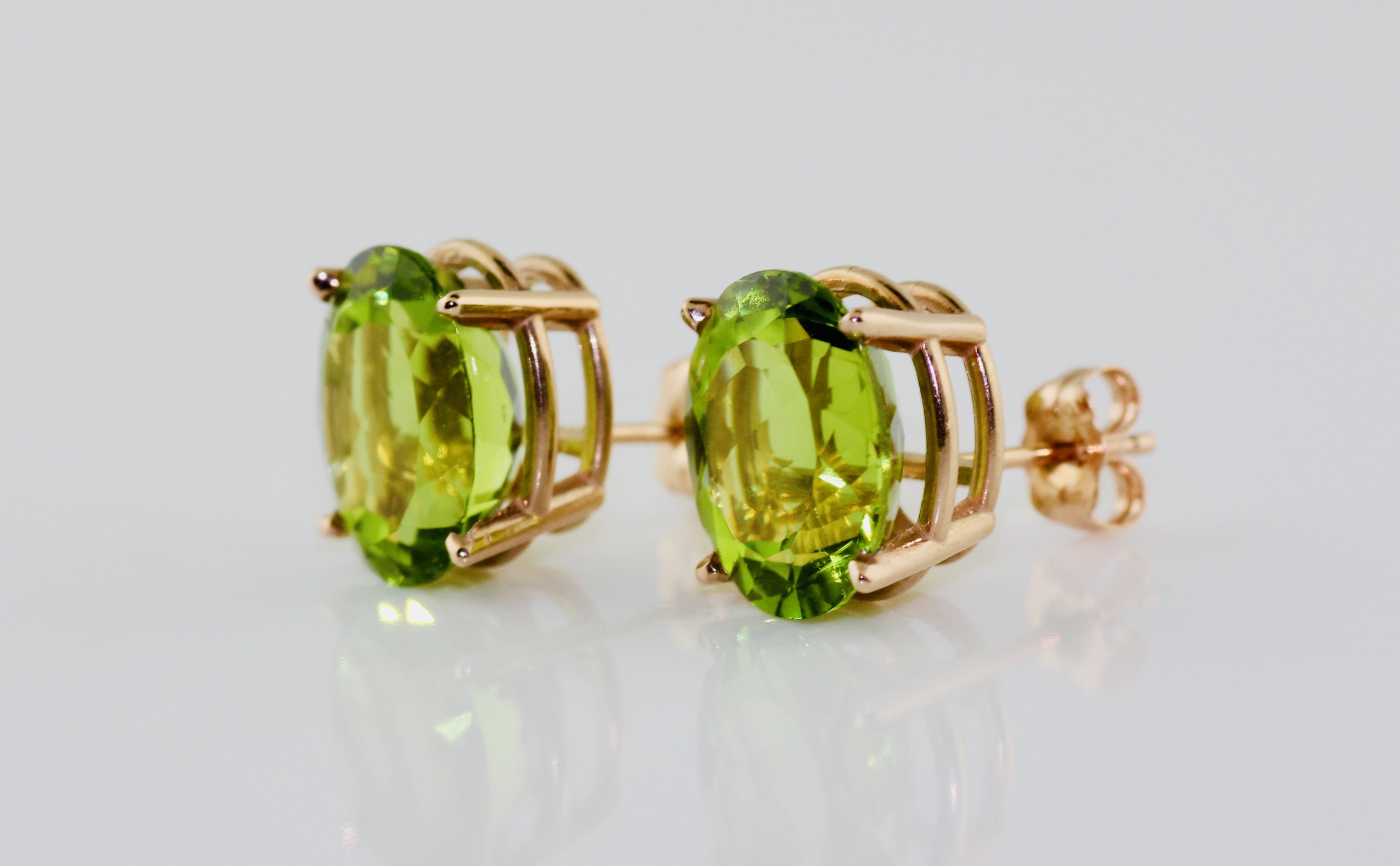 14K Yellow Gold Peridot (7.85ct, AA) Oval Stud Earrings