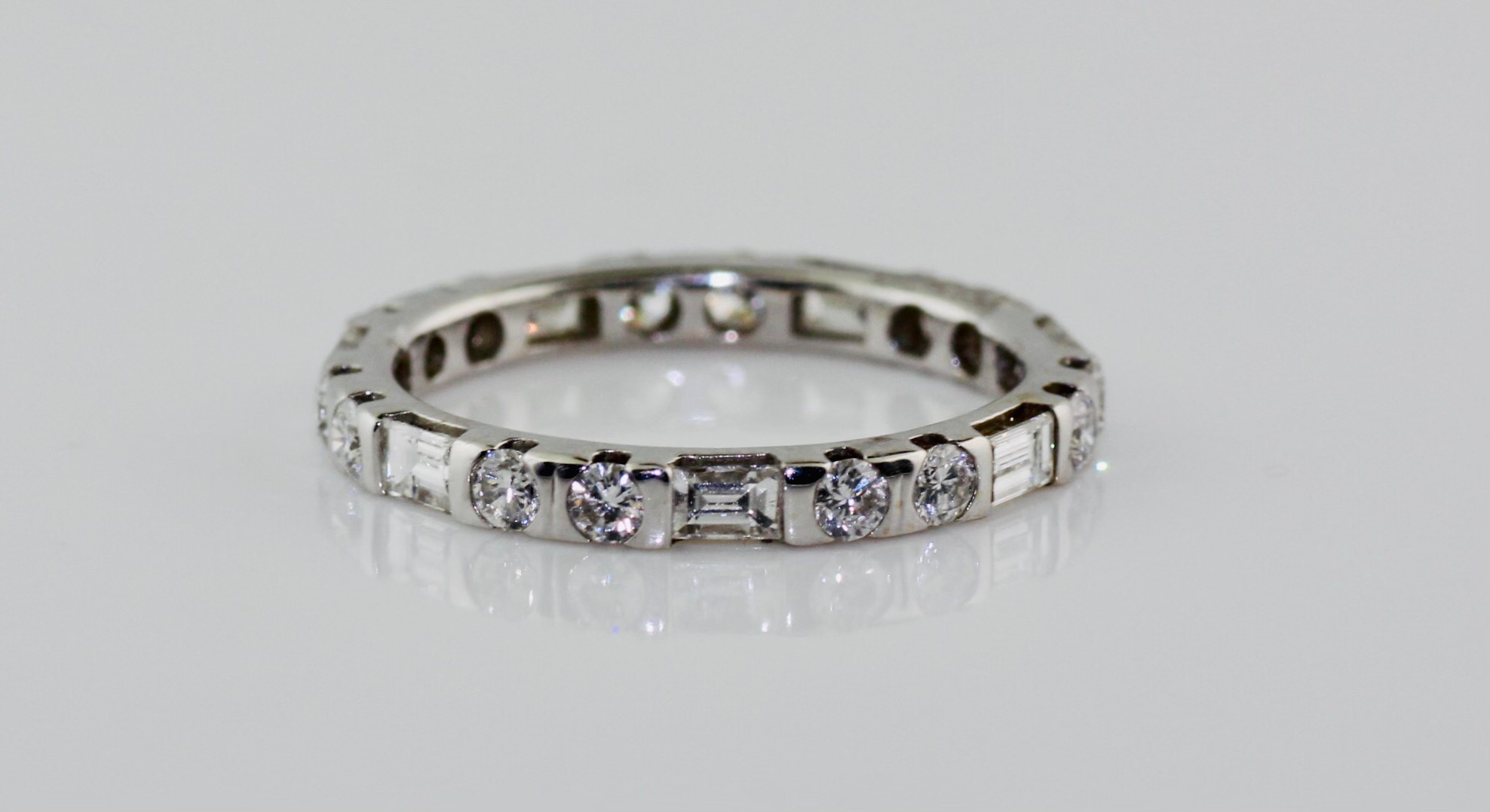 14KW Round and Baguette Diamond (1.12ctw) Wedding Band (.55r .57B)