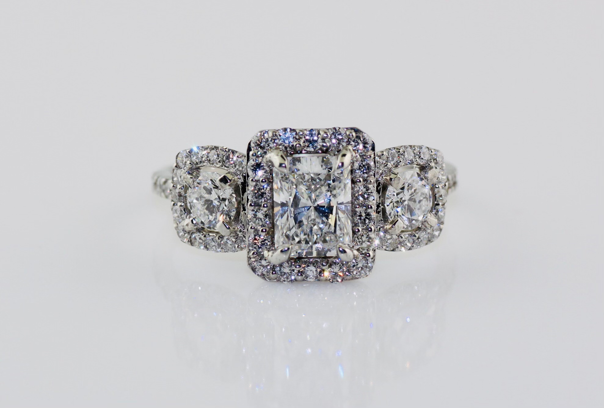 Platinum Lab Grown Diamond (Center: .90ct, Sides: .50ctw) and Natural Diamond (.60ctw, SI1, E) Engagement Ring