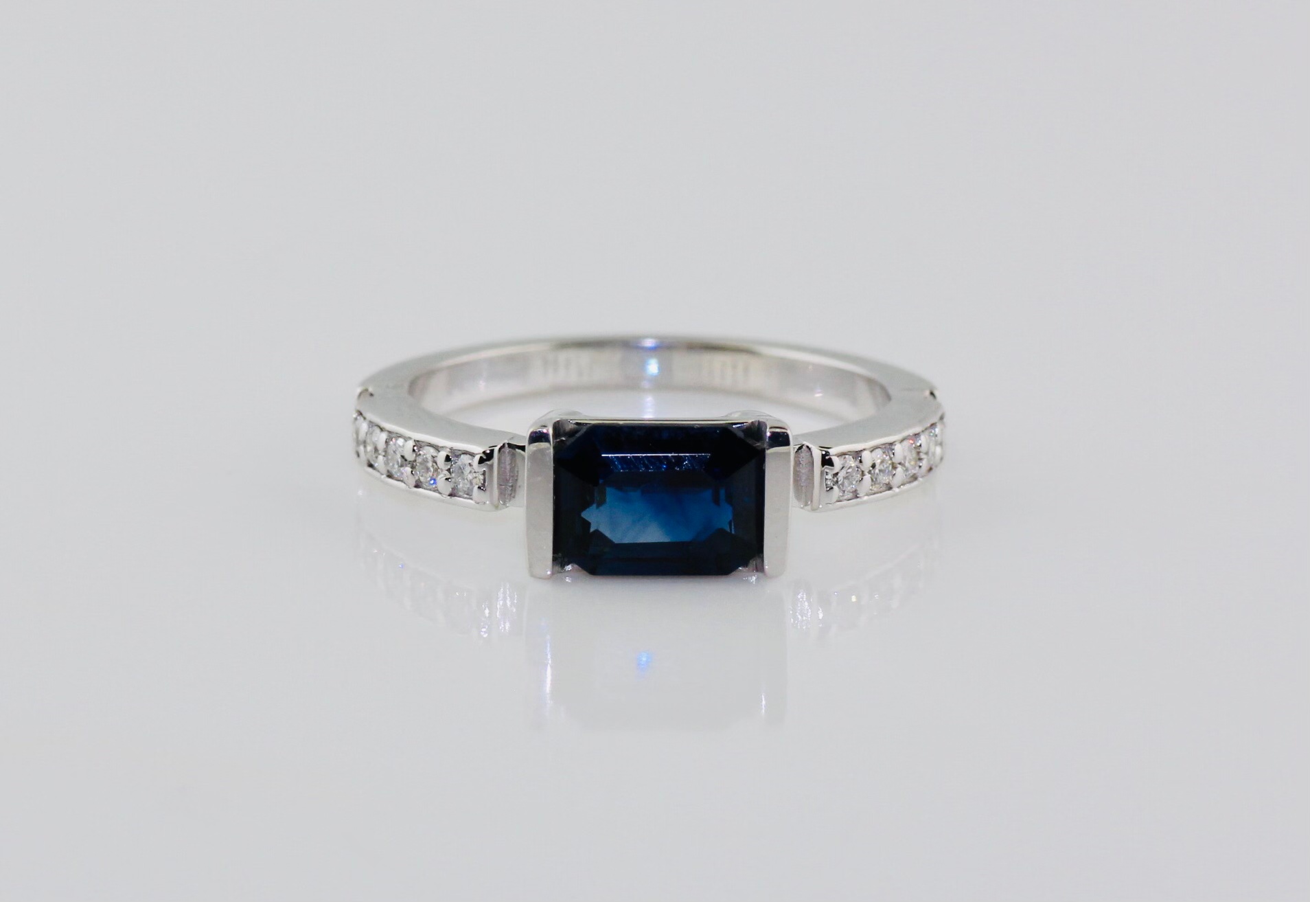 14KW Blue Sapphire (1.38ct, emerald cut) and Diamond Ring