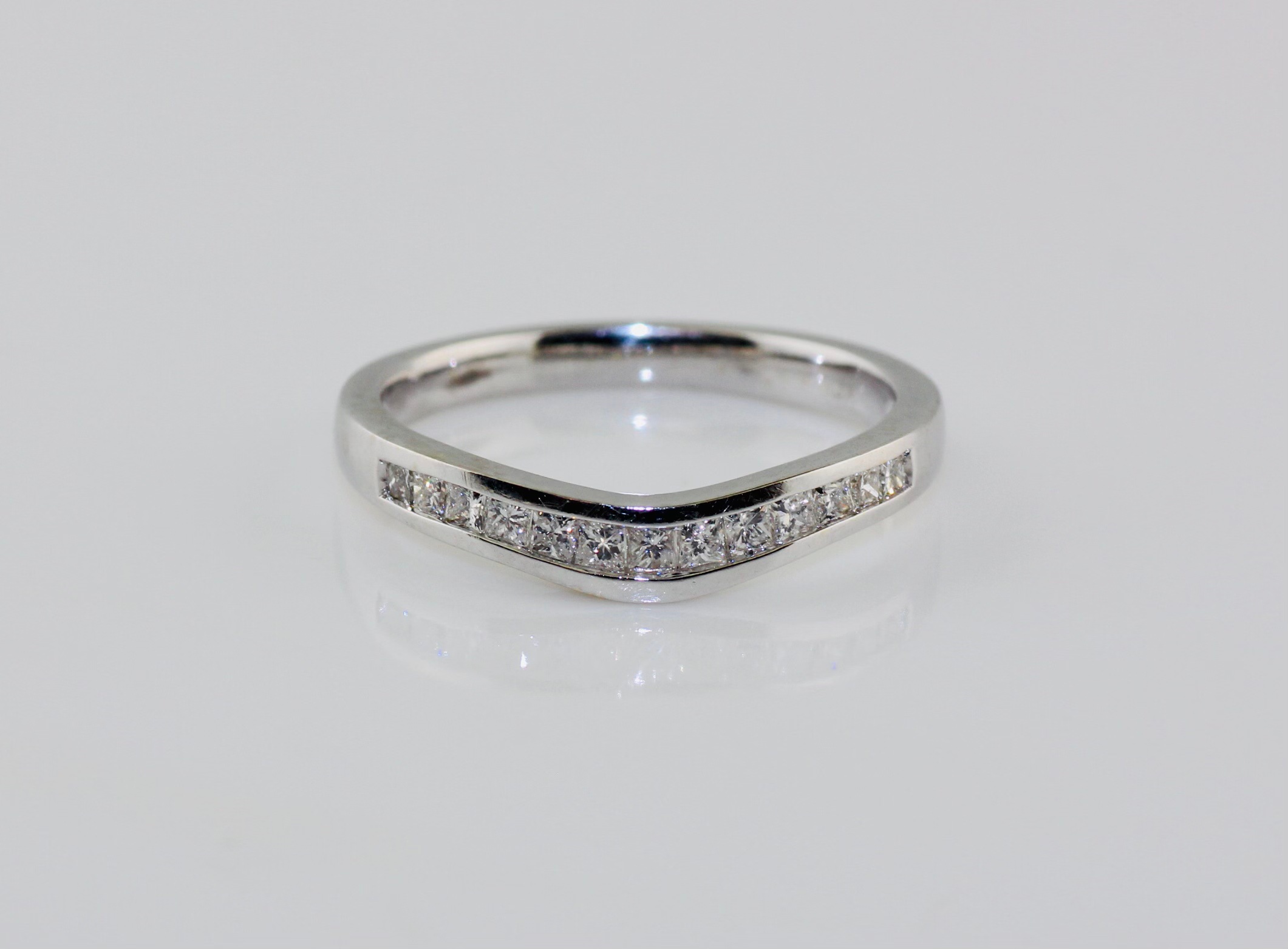 14K White Gold Diamond (0.65ctw, VS2, F-G) Channel Set Curved Wedding Band