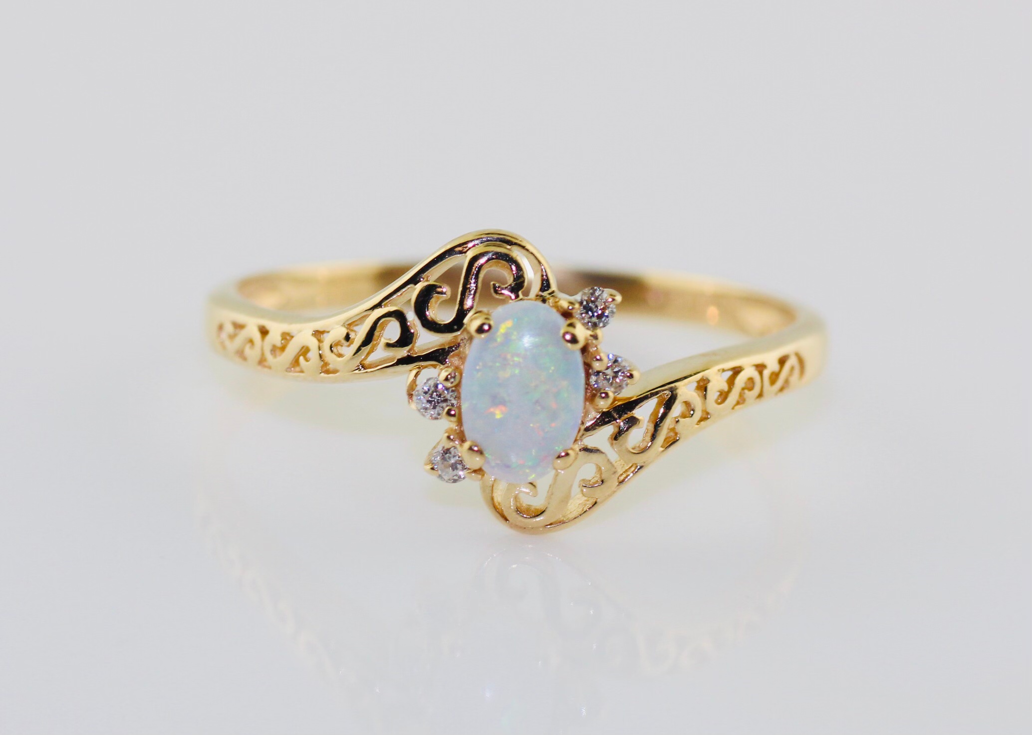 14K Yellow Gold Opal and Diamond Ring with Detailed Setting