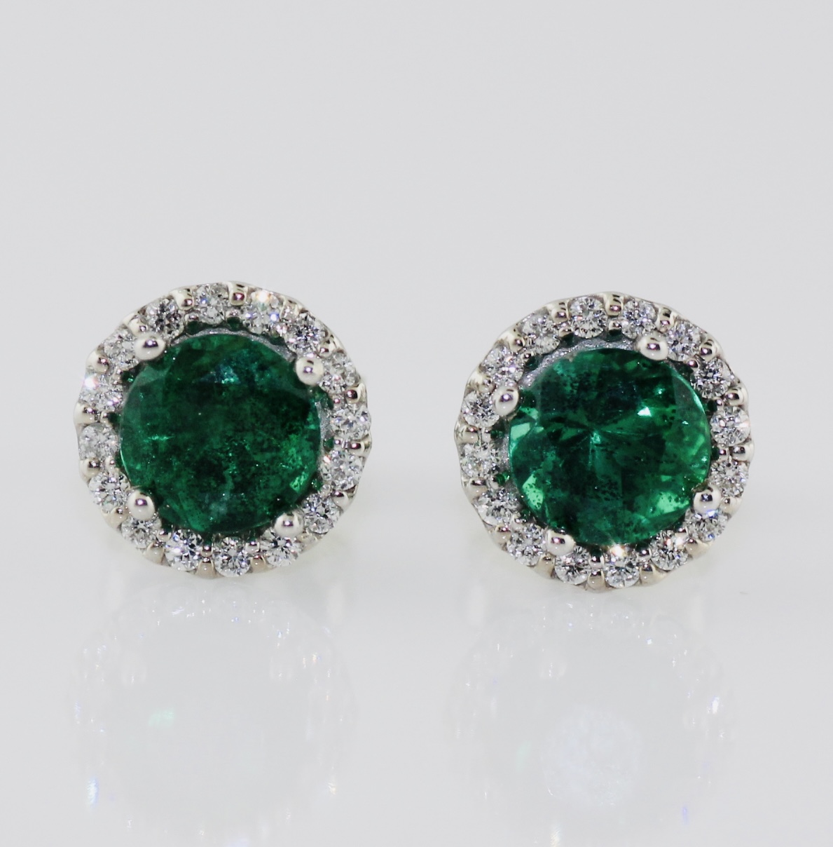 14K White Gold Emerald (0.86ct) and Diamond (0.18ctw) Stud Earrings